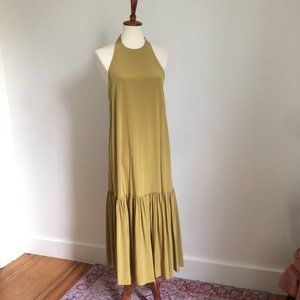 100% silk dress. Gold color, size 6